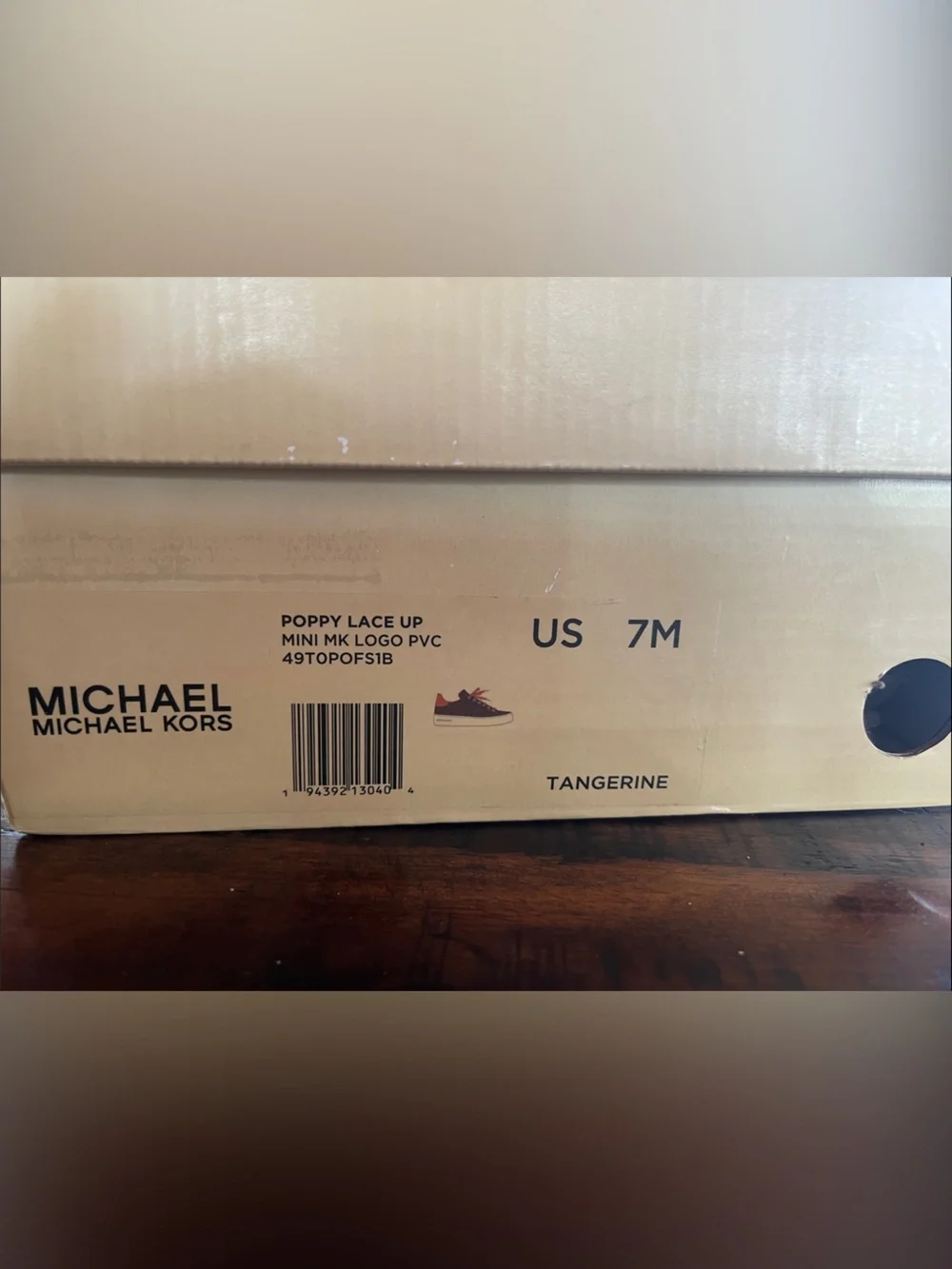 Michael Kors Woman’s Brown MK Monogram Sneaker with Orange Accents